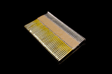 Set of construction nails isolated on the black