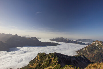 Fog sea over the lake lucerne seen from the mountain Rophaien