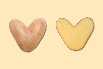 two halves of natural heart-shaped potato