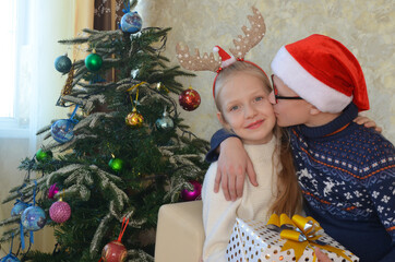 Happy caucasian family celebrating christmas holiday at home. Children having fun together lifestyle