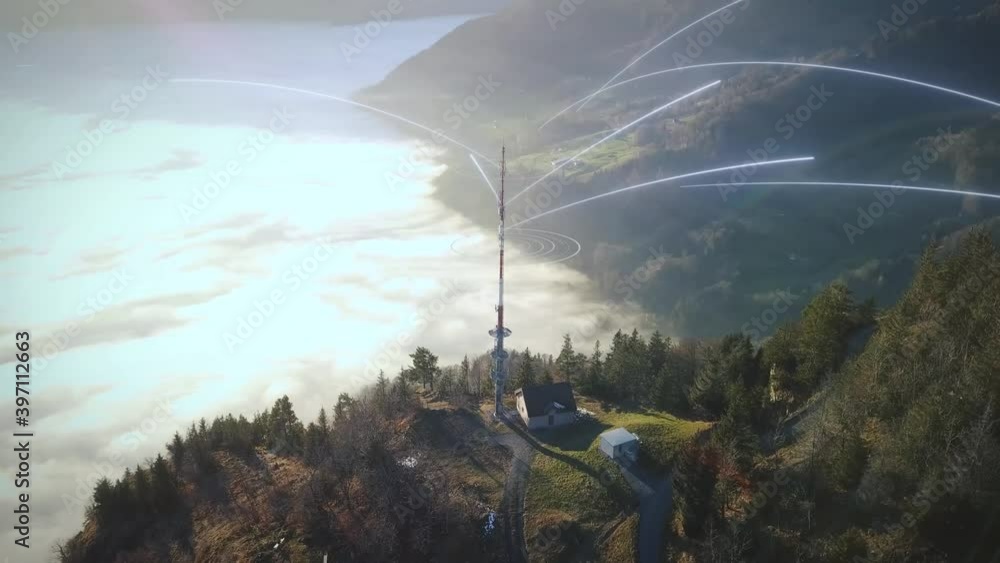 Aufkleber antenna station on mountain above clouds in the valley sends out digital network lines with 5g data.