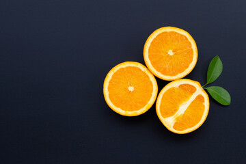 High vitamin C, Juicy and sweet. Fresh orange fruit on dark background.