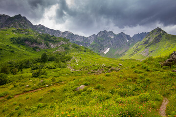 Fototapeta na wymiar Beautiful mountain landscape at Caucasus mountains with clouds