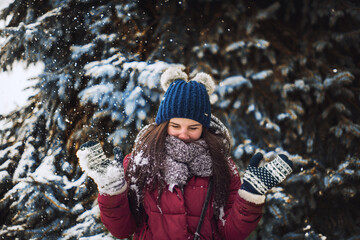 Surprise. portrait of a beautiful girl in a winter fairy tale. girl dressed in beautiful winter...