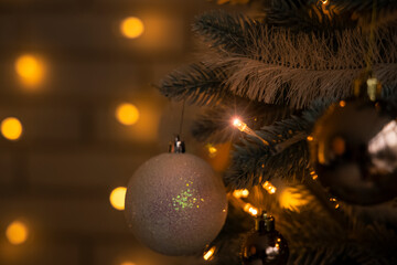 Christmas tree garland lamp with glare of light and unfocused bokeh lighting lamps festive...