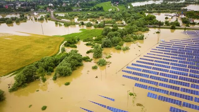 Aerial view of flooded solar power station.