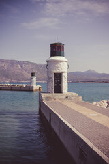 Fototapeta na wymiar Lighthouse at port of Corinth.