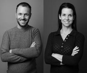 Two beautiful people in front of a colored background