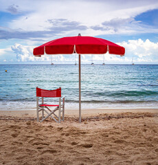 Lifeguard Chair and parasol at empty beach of Fetovaia, Island of Elba, Tuscany, Italy  swimmers rescue and safety concept © lotusblüte17