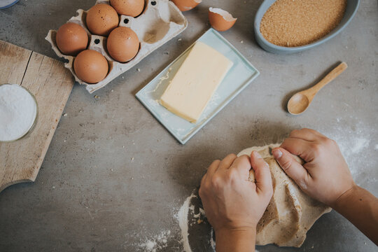 Woman's hands kneading the dough. Making gingerbread cookies Christmas baking preparation step by step