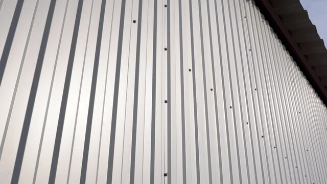 White Corrugated metal sheet surface of the wall. Galvanize steel background.
