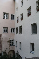 Fototapeta na wymiar courtyard corner of a house with windows