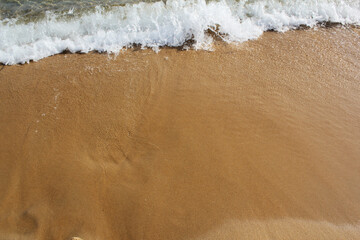 Sand beach and wave