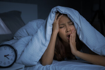 Depressed young woman lying in bed cannot sleep from insomnia - obrazy, fototapety, plakaty