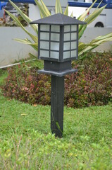 Beautiful vintage forged lantern in the garden.