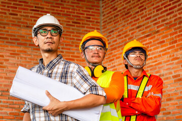 teamwork construction, Group portrait of professional engineer or architect and construction worker...
