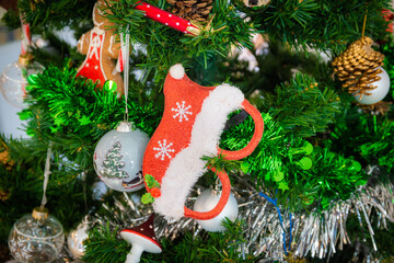 Christmas tree decorated with balls and gift boxes with snowmen to celebrate the festival. Copy space background