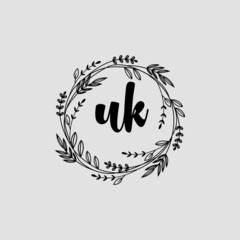 Obraz premium UK Initial handwriting logo template vector 