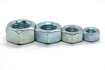 Big and small screw-nut. Concept. White background.