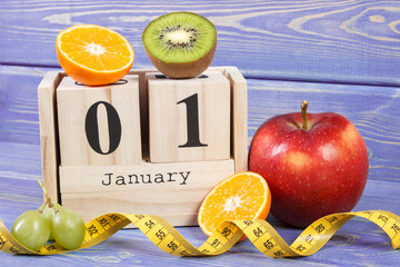 Cube calendar, fruits and tape measure, new years resolutions