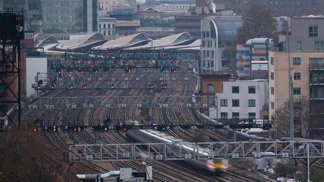 Time Lapse of trains traffic at London Bridge station with a long telephoto lens from an elevated viewpoints