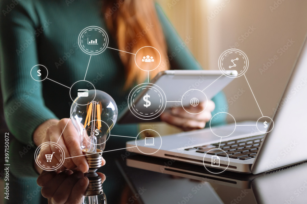 Poster business man hand holding lightbulb with using smartphone and calculator to calculate and money stac