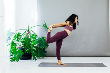 Beautiful woman yoga asana gymnastics flexibility body fitness