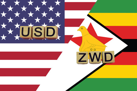 USA and Zimbabwe currencies codes on national flags background
