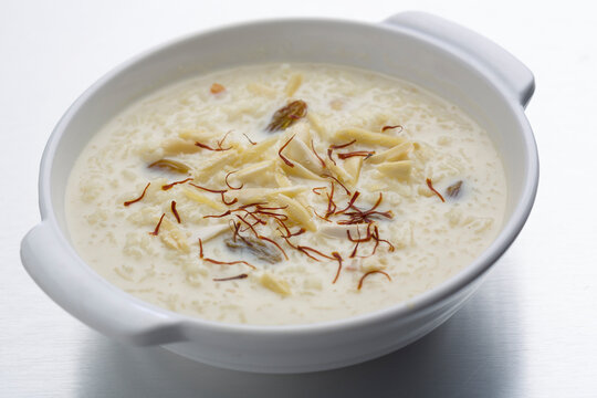 kheer or rice pudding is an Indian dessert in a bowl with dry fruits toppings