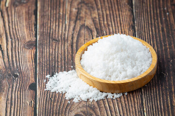 salt in wooden small plate