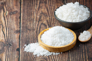 salt in wooden small plate