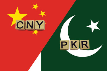 China and Pakistan currencies codes on national flags background