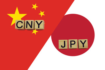 China and Japan currencies codes on national flags background