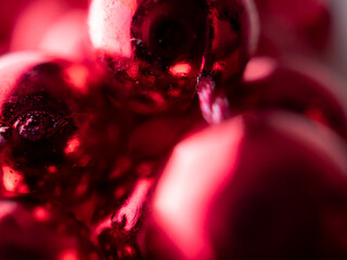 The side of garland blurred Christmas background.