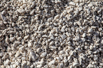 Stone gravel at a construction site as a background.