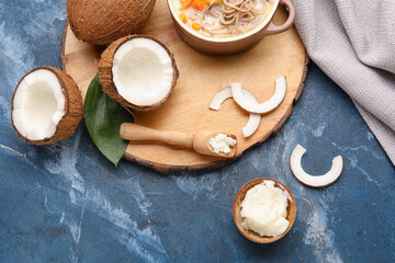 Composition with tasty coconut oil for cooking on color background