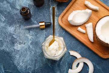 Composition with cosmetics and coconut oil on color background