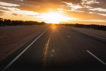 Fototapeta na wymiar Sunset on highway