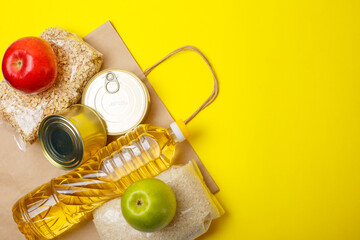 grocery set on a yellow background, flat lay