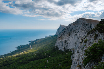 Fototapeta na wymiar Amazing cliffs in the calm sea. Crimea, Russia. View from the sea.