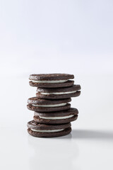 Fototapeta na wymiar Stuck of Chocolate sandwich cookies with vanilla cream filling.