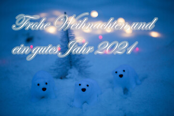 Fototapeta na wymiar Polar bears in the snow, with fairy lights, Christmas greetings,