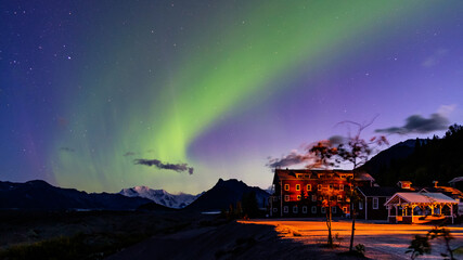 Northern lights over valley. Dancing sky.