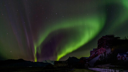Northern lights over valley. Dancing sky.
