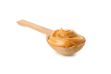 Spoon with peanut butter isolated on white background
