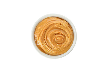 Bowl of peanut butter isolated on yellow background, top view