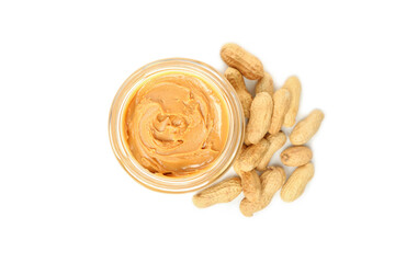 Peanut and jar with peanut butter isolated on white background