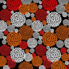 Tropical seamless vertical border with palm leaves, exotic flowers and hummingbirds on a black background. Vector illustration.