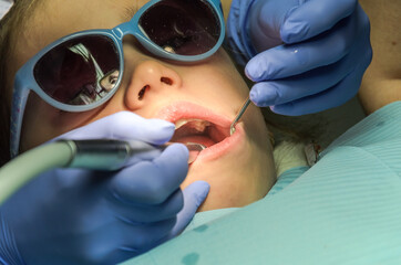 Children's dentist treats baby teeth