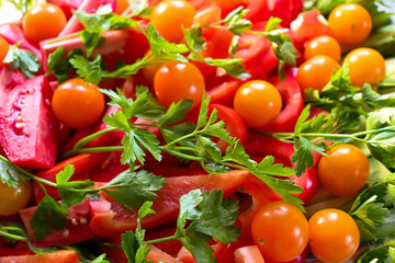Chopped fresh vegetables and greens for salad